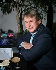 C. Rick Ellis, licensed clinical psychologist and forensic psychologist, at his desk in Virginia Beach, Va.